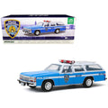 1988 Ford LTD Crown Victoria Wagon Light Blue and White 1/18 Diecast Model Car P76076