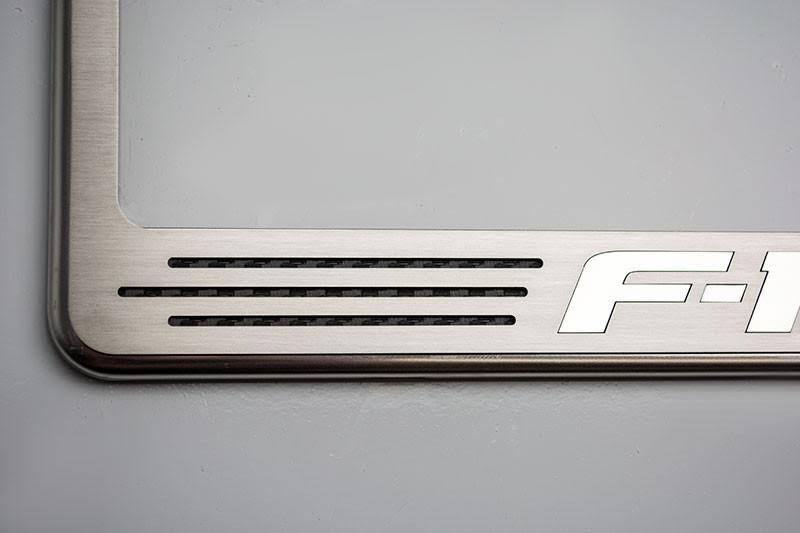 Stainless Steel License Plate Frame with Red Accents F579